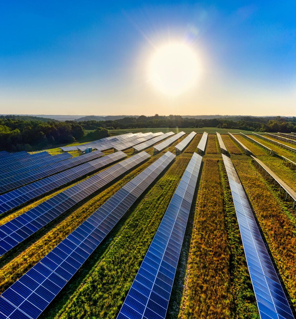pexels-photo-9893729-9893729-1 Aerial view of a solar farm in Red Wing, MN, with solar panels harnessing the sun's energy.